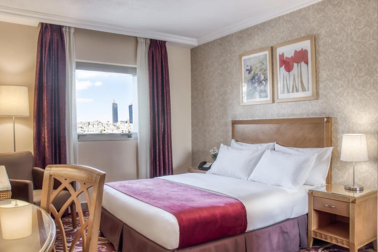 Geneva Hotel Аман Екстериор снимка