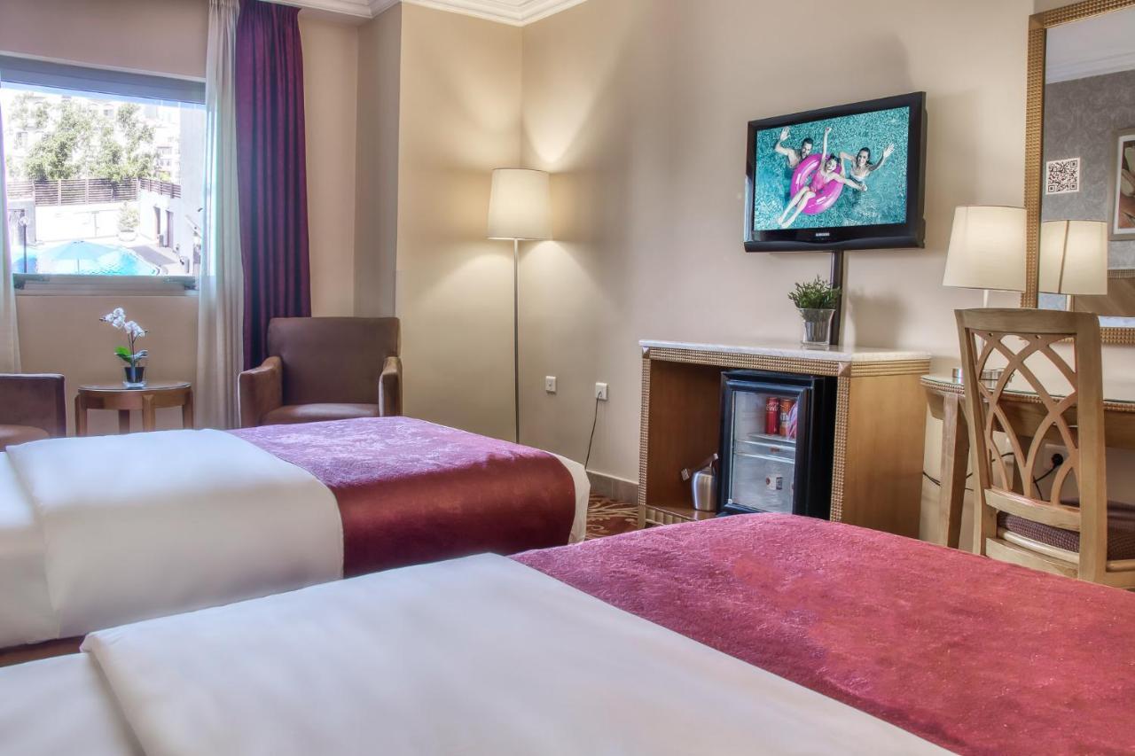 Geneva Hotel Аман Екстериор снимка