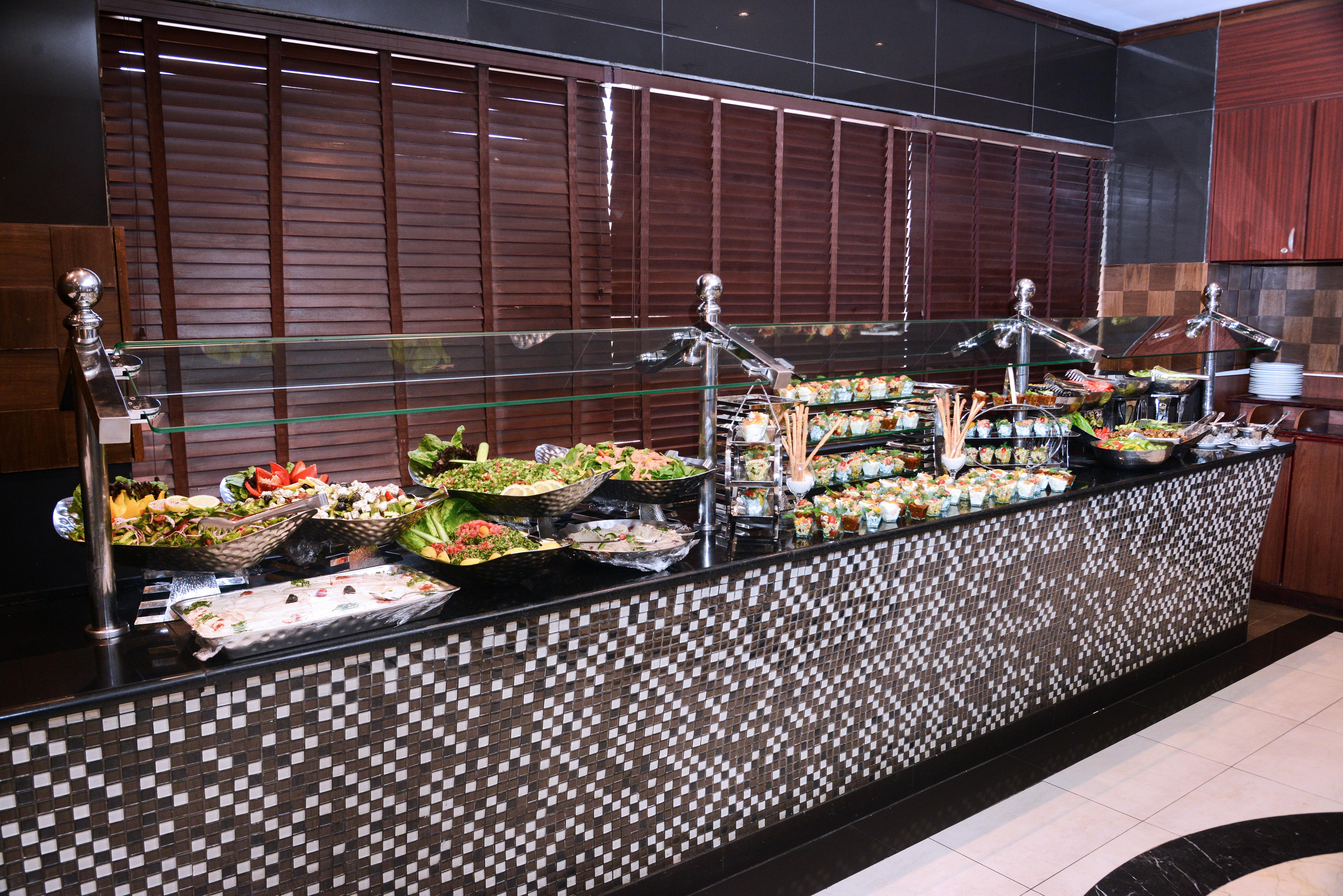 Geneva Hotel Аман Екстериор снимка