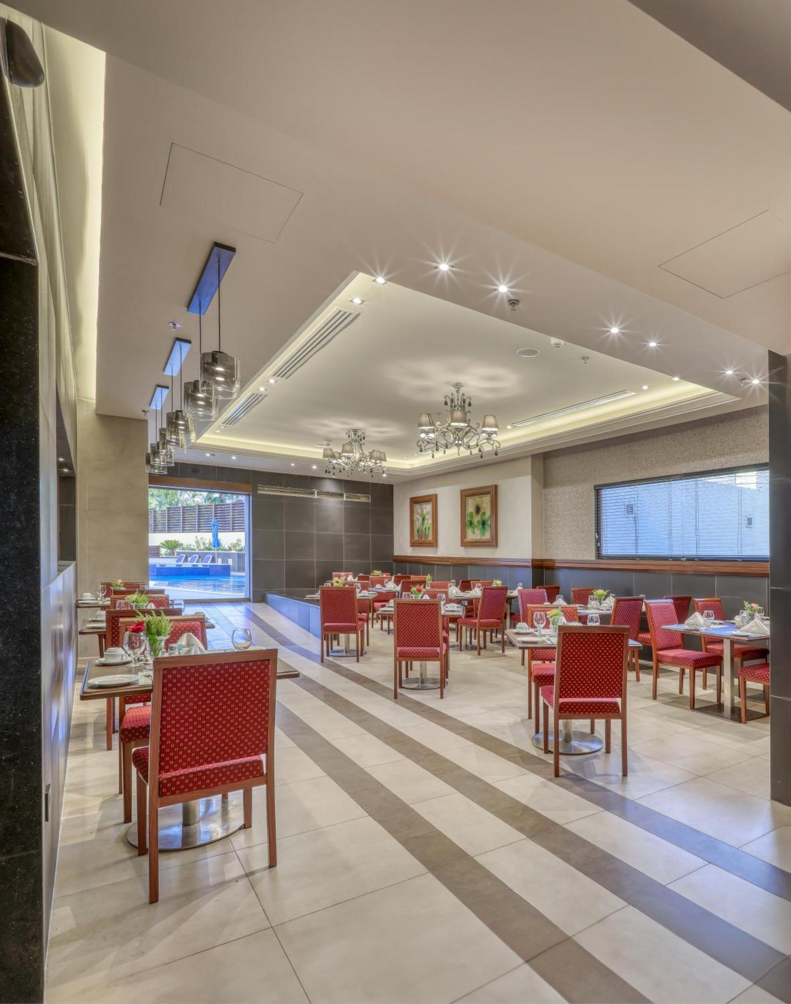 Geneva Hotel Аман Екстериор снимка