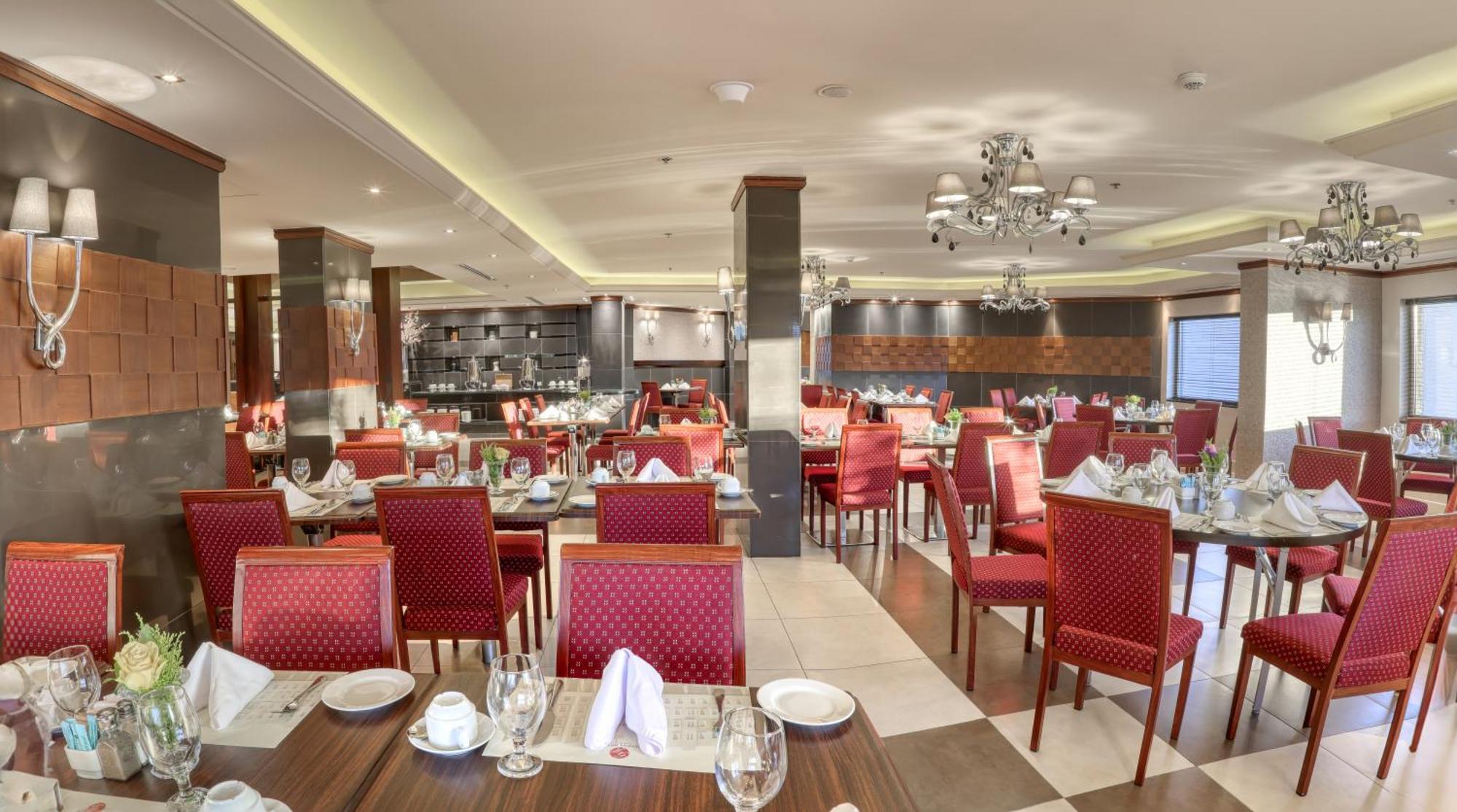 Geneva Hotel Аман Екстериор снимка