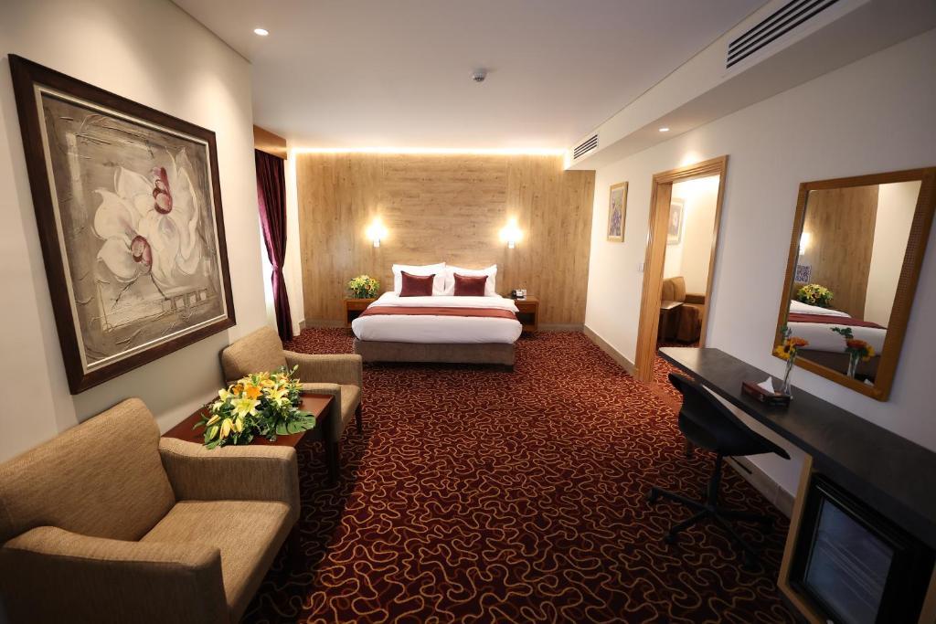 Geneva Hotel Аман Екстериор снимка