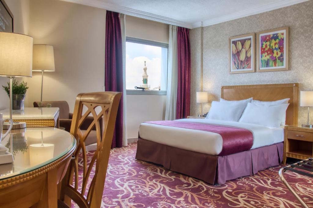 Geneva Hotel Аман Екстериор снимка
