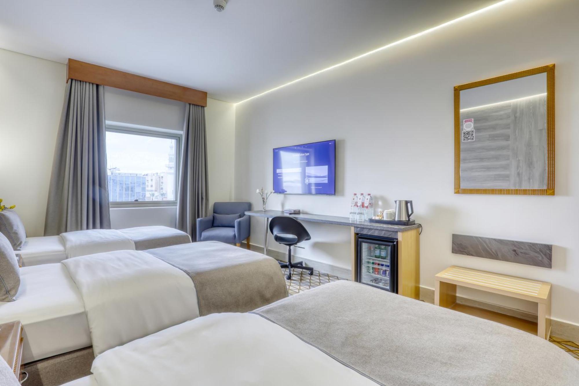 Geneva Hotel Аман Екстериор снимка