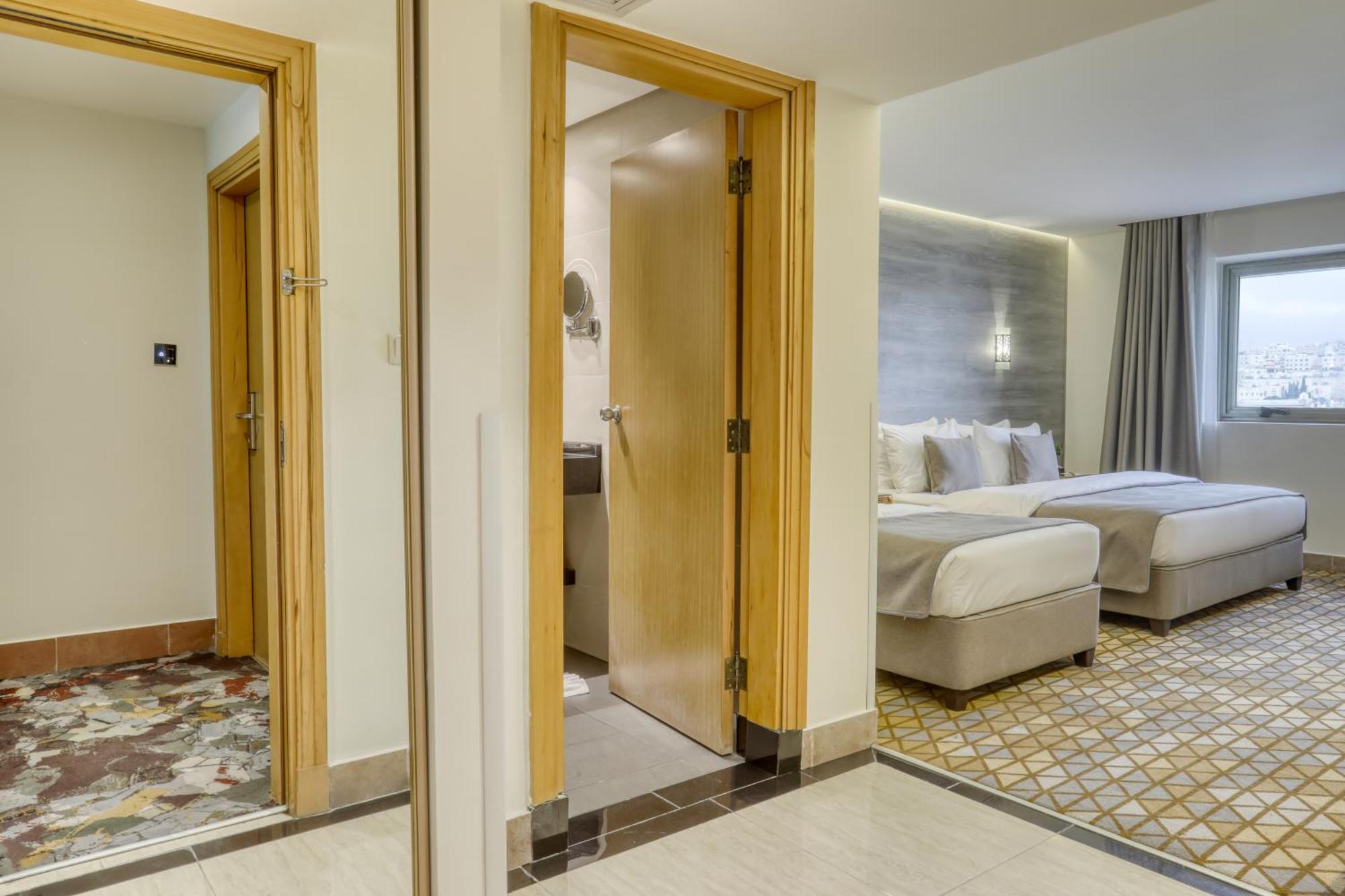 Geneva Hotel Аман Екстериор снимка