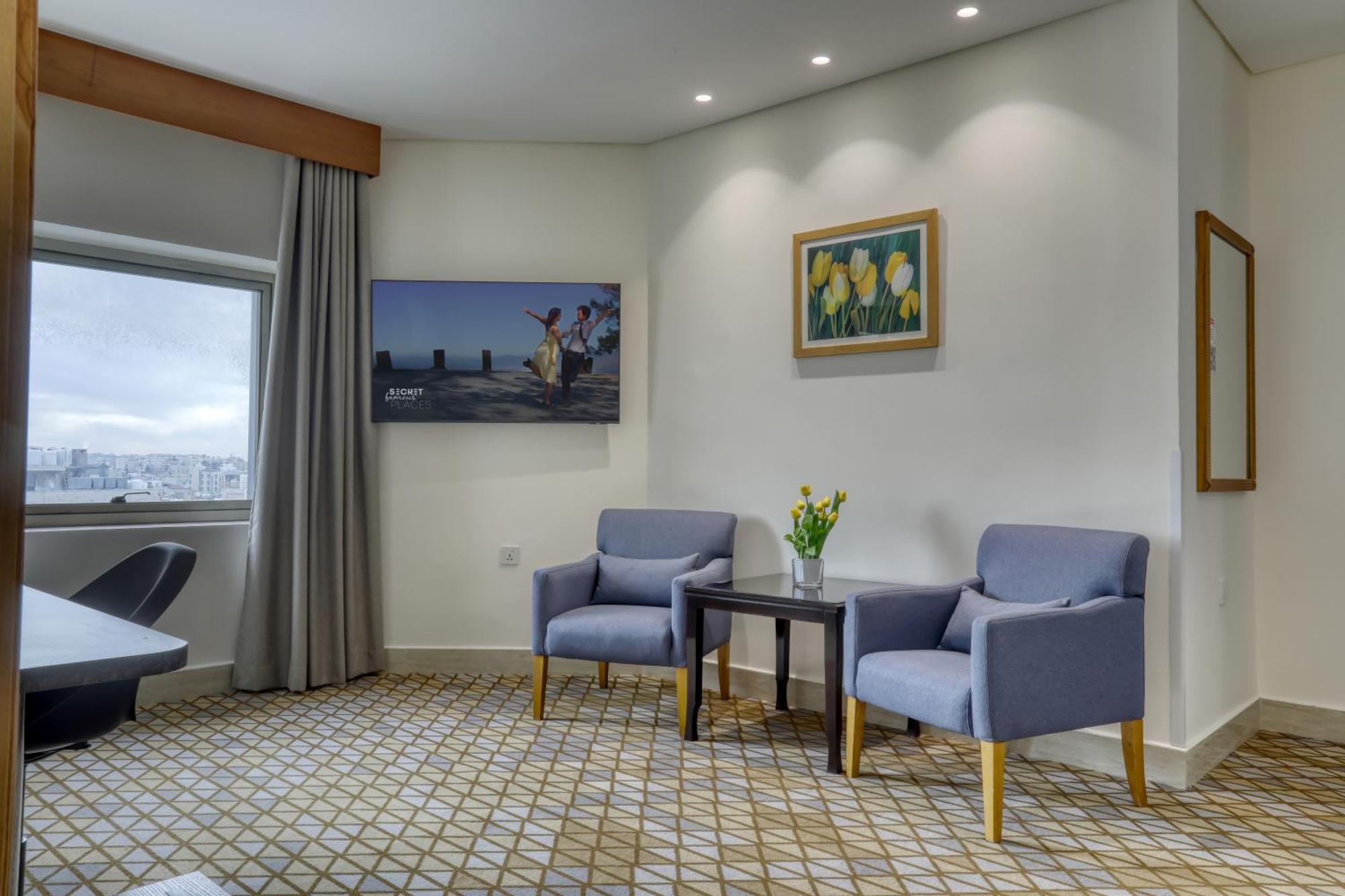 Geneva Hotel Аман Екстериор снимка