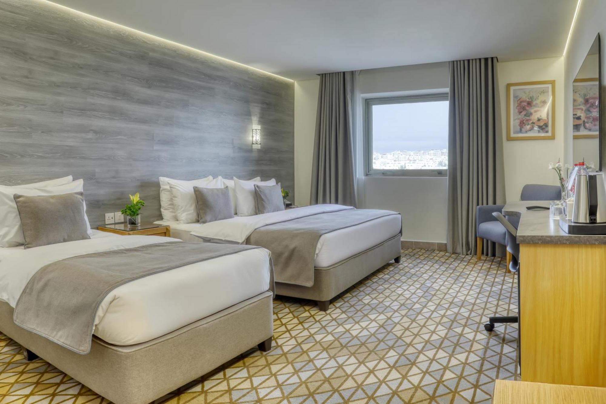 Geneva Hotel Аман Екстериор снимка