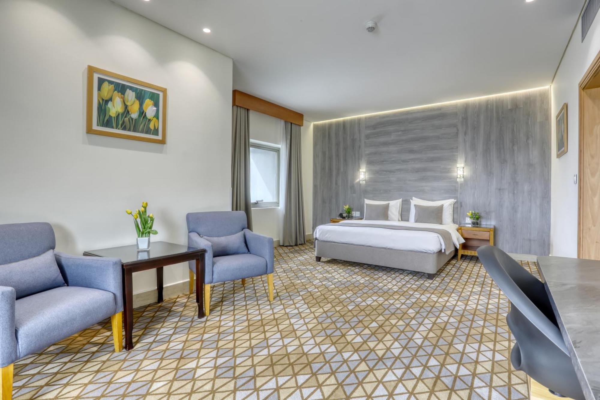 Geneva Hotel Аман Екстериор снимка