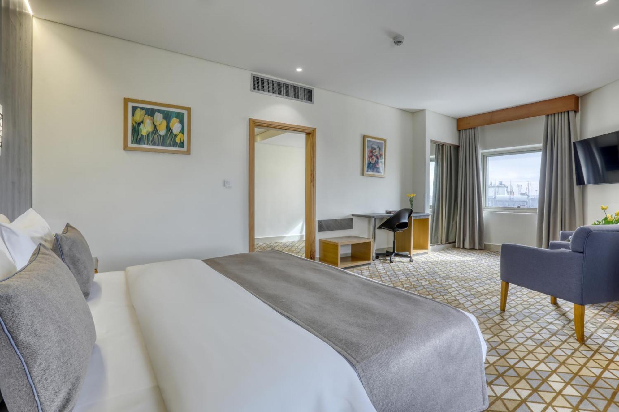 Geneva Hotel Аман Екстериор снимка