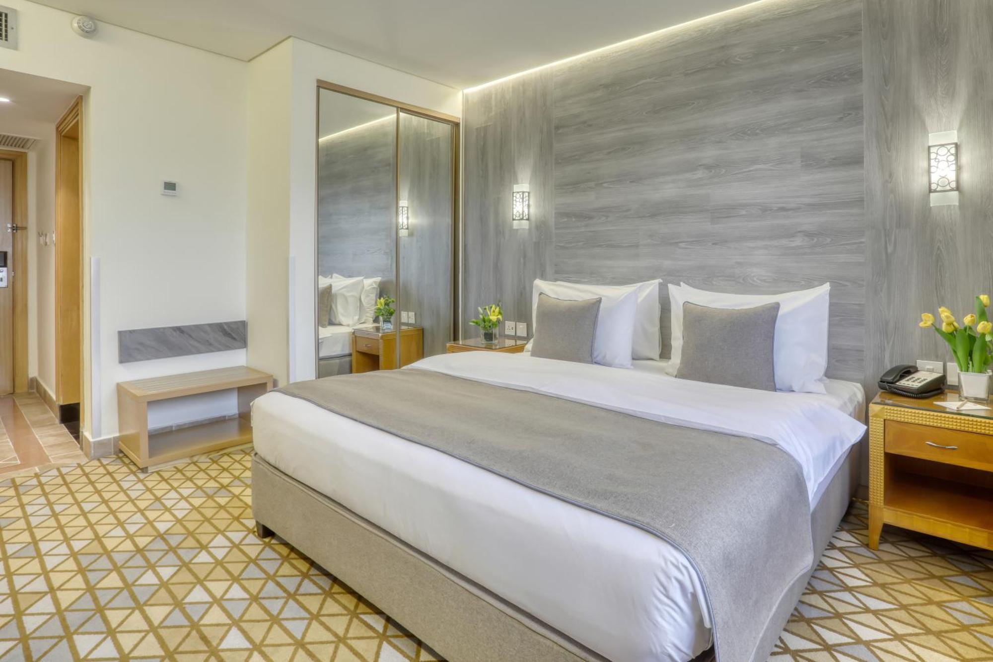Geneva Hotel Аман Екстериор снимка