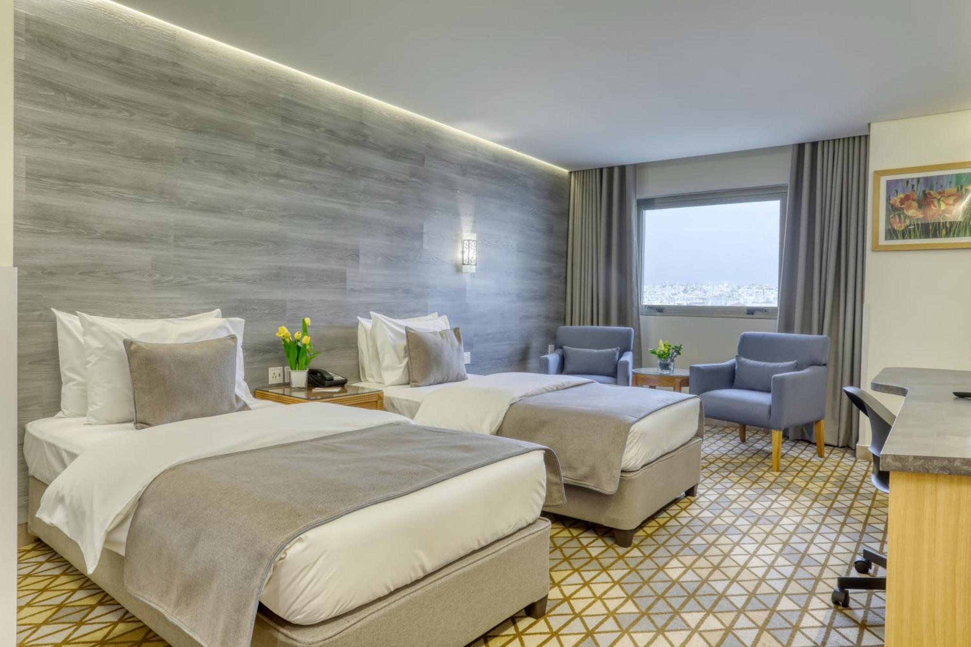 Geneva Hotel Аман Екстериор снимка