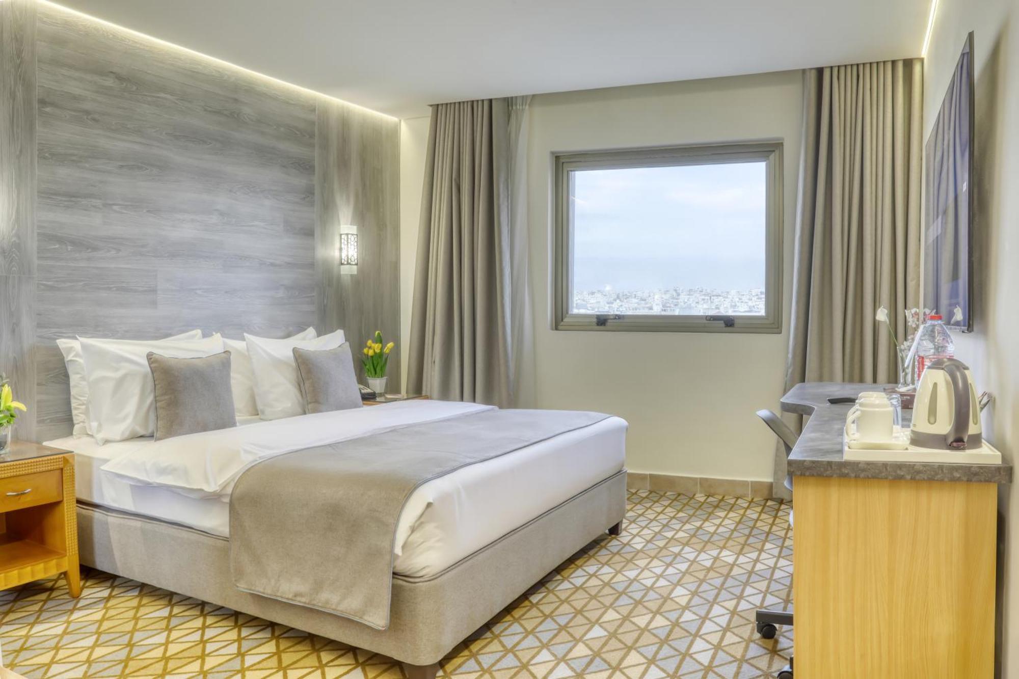 Geneva Hotel Аман Екстериор снимка