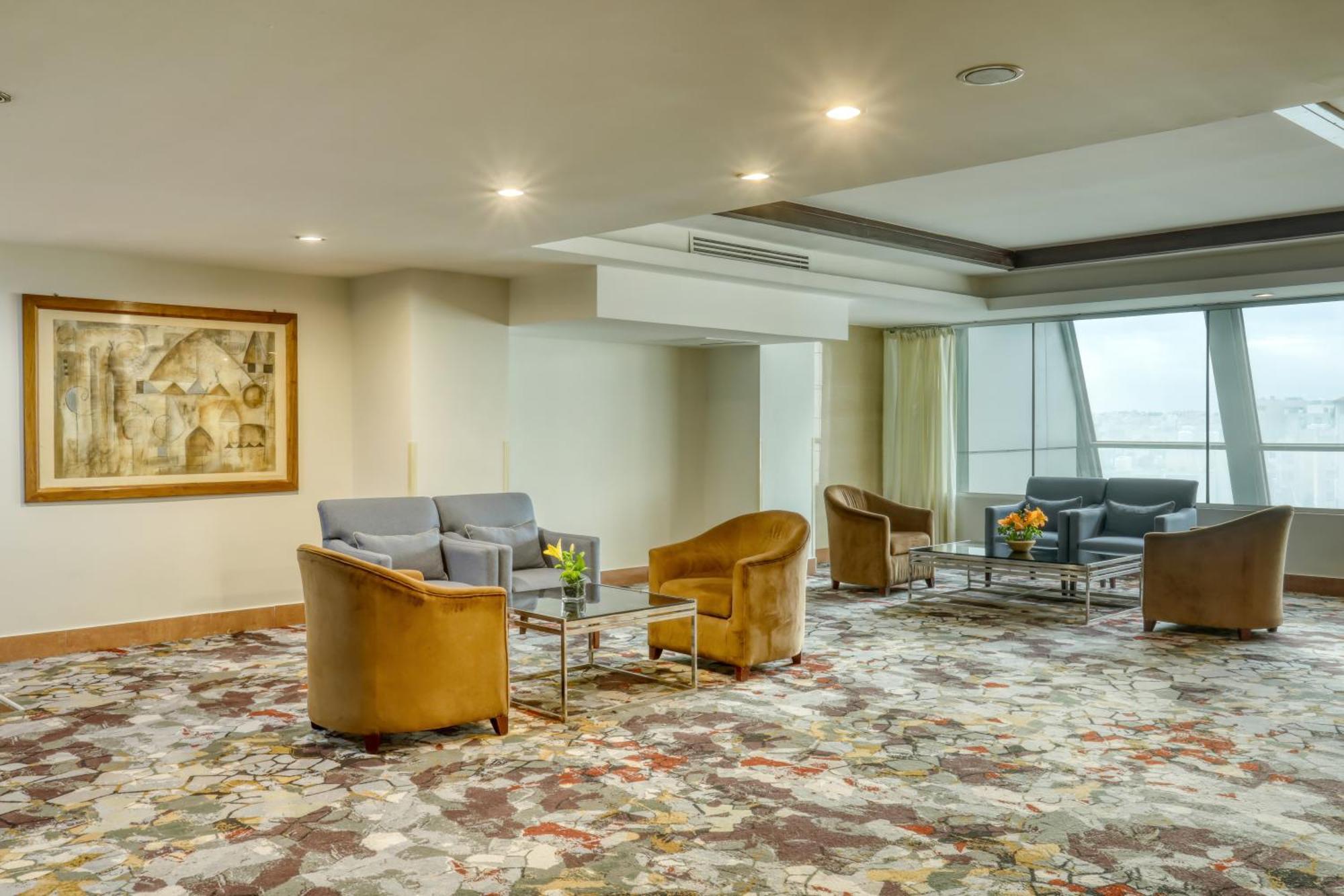 Geneva Hotel Аман Екстериор снимка